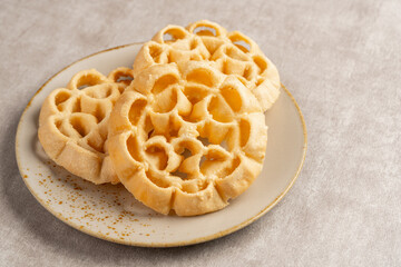 Kembang Goyang or shaking flower, Indonesian typical homemade crispy fried snack in flowers shape and typical of Betawi Snack.