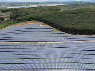 Aerial view of solar panels In the electric industry. Green energy that can be renewable for environment. Solar power alternative energy from scientific innovation