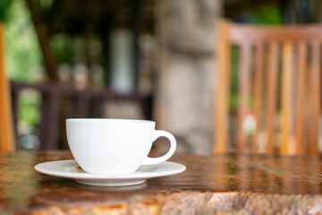 Coffee Cup on Table Against Landscape Scenery Mountain Hill Background