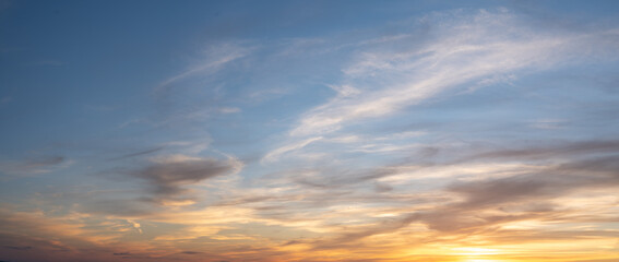 sky sunset. Real amazing panoramic sunrise or sunset sky with gentle colorful clouds. wide...