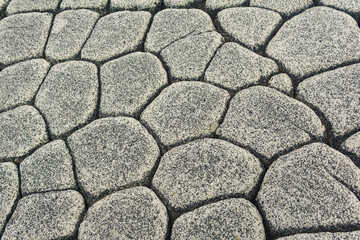 natural stone background, the remains of lava basalt columns form a kind of cobblestone causeway