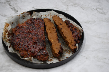 Air fried vegan seitan steaks  glazed with raspberry chipotle sauce