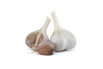 Garlic bulbs in close-up on white background