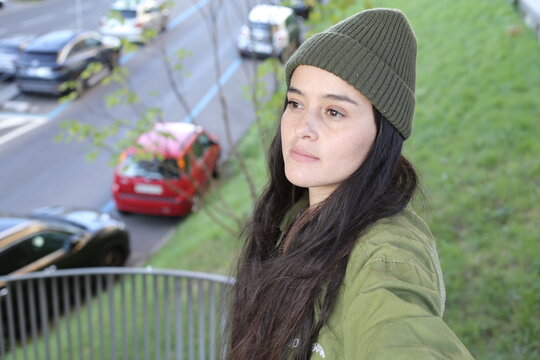 Young ethnic urban woman wearing a beanie