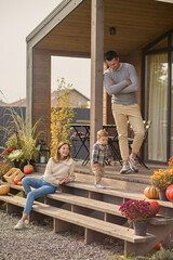 Young child spending time with his parents outdoors