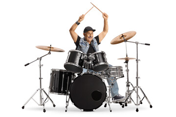 Cheerful mature drummer with drumsticks up