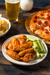 Homemade Pepperoni Pizza Chicken Wings and Beer