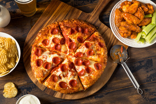 Homemade Pepperoni Pizza Chicken Wings And Beer