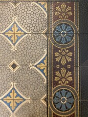mosaic ornament, on art pattern tiles floor. Top view.