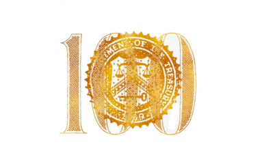 closeup of golden textured cut number 100 of dollar bill