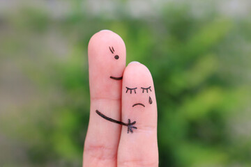 Fingers art of mother comforts her daughter.