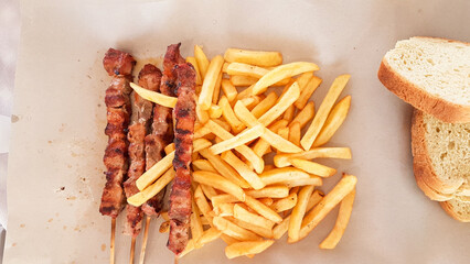 souvlakia or suvlakia on barbeque prepared in greece