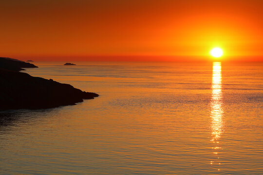 Beautiful Orange Sunset over Amlwych from Point Lynas. Anglesey, North Wales, UK.