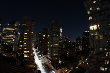 new york city night aerial cityscape from terrace rooftop