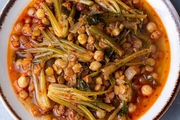 Spinach head dish or spinach head soup. It is a local dish. This dish, which is made in Adana, Turkey, is also sour. Turkish name; ispanak basi corbasi or yemegi