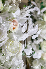 Decoration with artificial white roses.