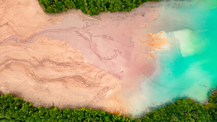 Aerial photography of the industrial decanting lake at Geamana in Romania. The photography was shot from a drone revealing the lake's vibrant colors and contrasts.