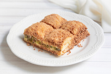Traditional turkish new dessert cold milky baklava with pistachio (Turkish name; soguk baklava)