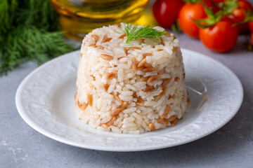 Traditional delicious Turkish food; Turkish style rice pilaf (Turkish name; Arpa sehriyeli pirinc pilavi)