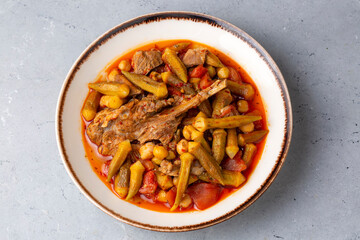 Traditional delicious Turkish cuisine. Locally cooked okra dish. Turkey Adana style meat okra dish. Turkish name; etli bamya yemegi.