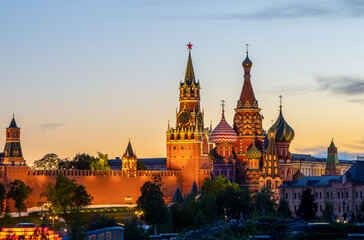 Fototapeta na wymiar Moscow Kremlin and St. Basil's Cathedral at night, Russia. Moscow's main tourist attraction. Evening view of the sights of Moscow in summer. Panorama of the center of Moscow at dusk.