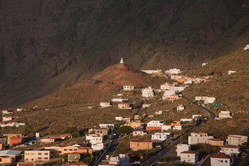 campanario de joapira de d&iacute;a, y vista de la frontera, en la isla de el hierro, islas canarias