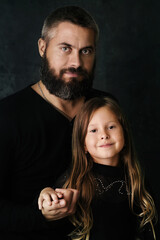 Portrait of a dad with a little daughter