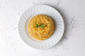 Traditional delicious Turkish food, bulgur pilaf with vermicelli (Turkish name; arpa sehriyeli bulgur pilavi)