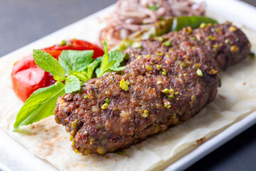 Traditional delicious Turkish cuisine, kebab type belonging to Adana and Antep regions, grilled pistachio kebab: Turkish name; fistikli kebab