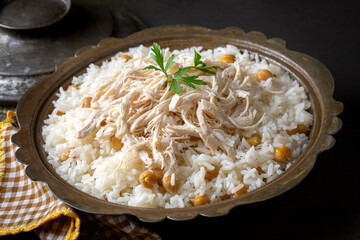 Traditional delicious Turkish food; Rice with chickpeas and chicken (Turkish name; Tavuklu nohutlu pilav or pilaf)