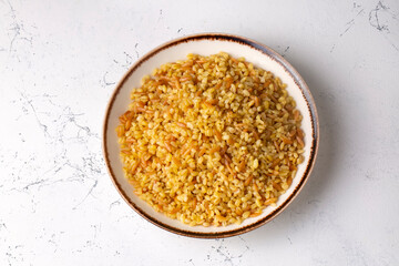 Traditional delicious Turkish food, bulgur pilaf with vermicelli (Turkish name; arpa sehriyeli bulgur pilavi)