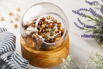 Fried ad creamy LE CHOU-CHOU served in a dish isolated on table side view of arabian dessert