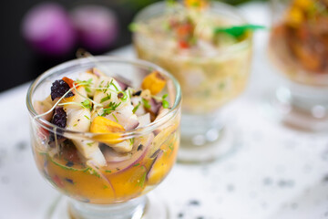 hot and cold entrees such as ceviche, octopus, asparagus, medallions, and tarts
