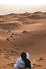 Fototapeta na wymiar man in the Sahara desert near the village of Merzouga