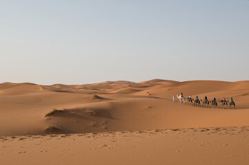 Fototapeta na wymiar caravan in the desert, trip from Merzouga, beautiful desert landscape
