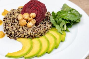 Vegetarian dishes such as salads, quinoa, avocado, vegetables and wraps