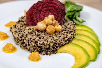 Vegetarian dishes such as salads, quinoa, avocado, vegetables and wraps