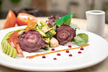 Vegetarian dishes such as salads, quinoa, avocado, vegetables and wraps