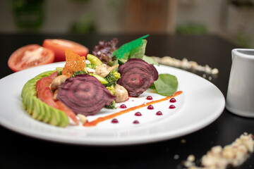 Vegetarian dishes such as salads, quinoa, avocado, vegetables and wraps