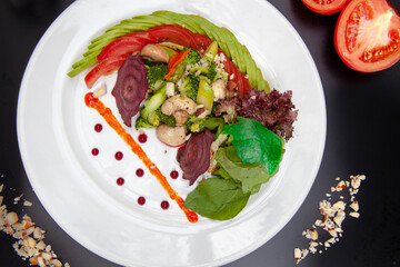 Vegetarian dishes such as salads, quinoa, avocado, vegetables and wraps