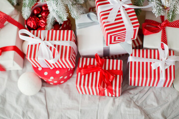 Fototapeta na wymiar Red and white Christmas gift boxes