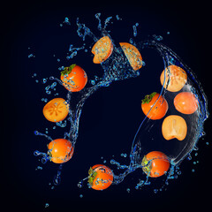 Wallpaper for designers and illustrators, juicy fruit persimmon in water