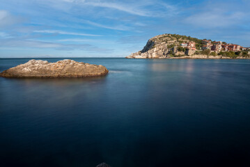 Amasra seascape, rock formations and cityscape of amasra city with blue sky and sea