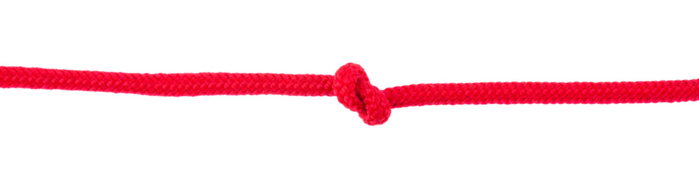 Red rope with knot isolated on white background.