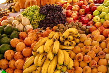 Fruit stall at the local market in San Blas, Cusco, Peru  Tropical fruits.  Variety of colorful fruits.