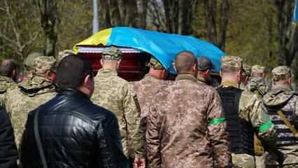 Ukraine. War. The funeral ceremony of a soldier. Funeral ceremony. The funeral of Ukrainian...