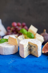 delicious blue brie blue cheese with grapes and figs