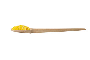 corn grits on wooden spoon isolated on white background. nutrition. food ingredient.