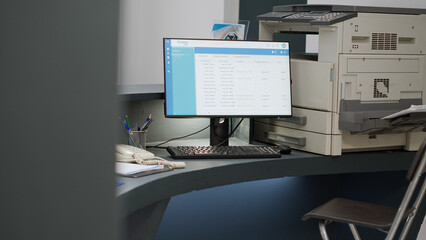 Empty facility reception desk used to give advice with healthcare insurance and help with medical checkup appointments. Hospital registration counter in health center, medicare report.