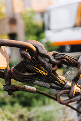Connection of iron, metal rusty hooks with a thick bracket close-up. Photography, metallurgy,...